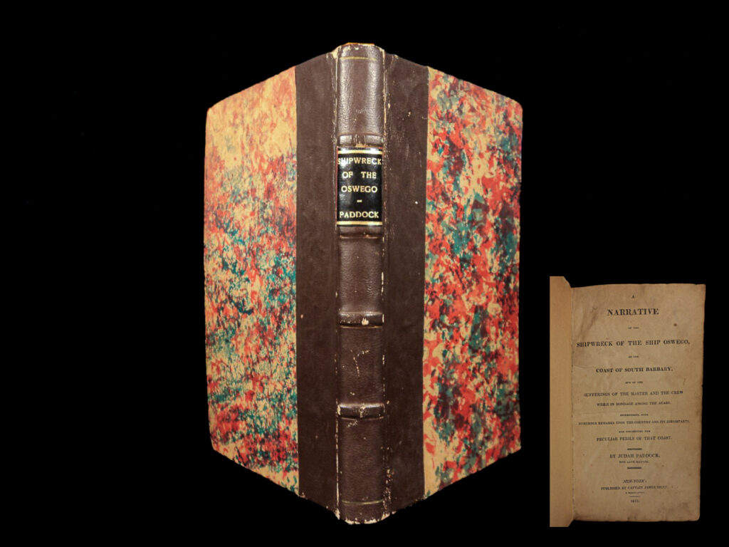 1818 capt paddock shipwreck of oswego africa slave trade slavery arab pirates | <em>a rare 1<sup>st</sup> english edition of the story of shipwreck of the oswego! </em> the oswego was a ship of 260 tons, of hudson, new york. Captain paddock sailed in her from new york for cork on january 8, 1800, with a crew of thirteen. From cork the oswego> sailed for the cape verde islands to pick up salt and skins for new york, but the ship was caught in an east-running current and struck on the coast of morocco, near cape hun, on april 3, 1800. The crew was soon captured by arabs, and separated, but captain paddock and some companions were soon taken to mogador and ransomed there, about may 17, 1801. He had some difficulty in getting passage back to the united states, but eventually arrived home at hudson on december 1, 1801. Click the description & details tab below to learn more.