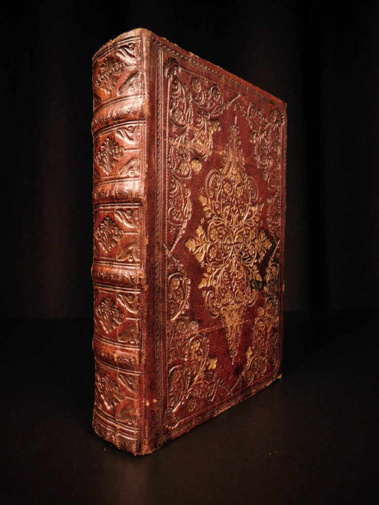 1750 bury romanorum pontificum catholic church popes gold gilt binding linz | <em> </em> <em>william bury was a 17<sup>th</sup>-century belgian theologian known primarily for his summation of papal history – ‘romanorum pontificum’. This work, published in the austrian city of linz, discusses the lives and papacies of the popes in a chronological manner. </em> <em> </em> <em>while the contents of this work are desirable, the binding of this example is the most intriguing element and is most exquisite! In 1750, copies of bury’s ‘pontificum’ were bound with oxidized gold-stamping on the decorative covers. This example retains much of the original gold that was stamped into the leather. Beautiful! </em>